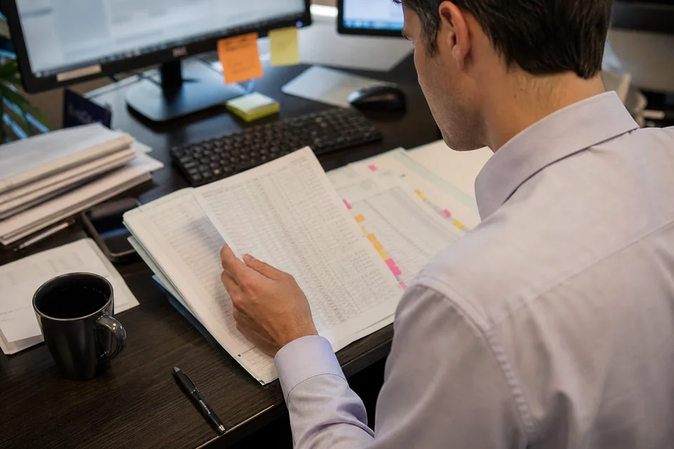 Loan underwriting file with three months of bank statements and sticky flags